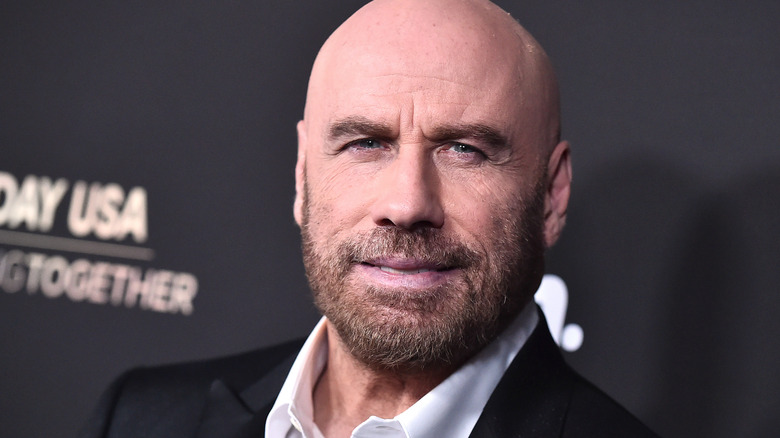 John Travolta with shaved head