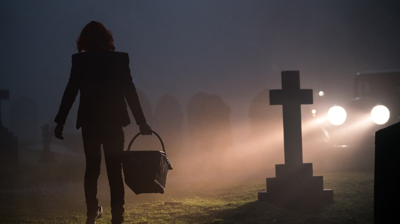 Crowley in a graveyard