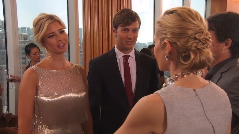 Ivanka Trump and Jared Kushner talking