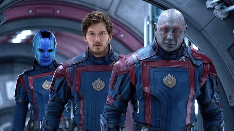 Nebula, Peter, and Drax walking together