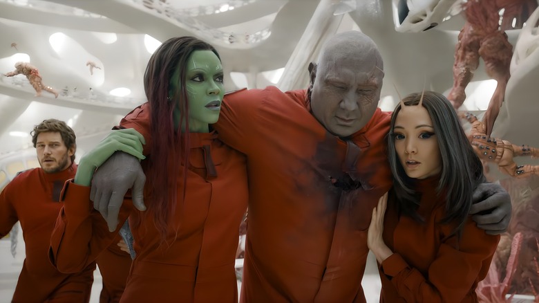 Gamora and Mantis carrying Drax