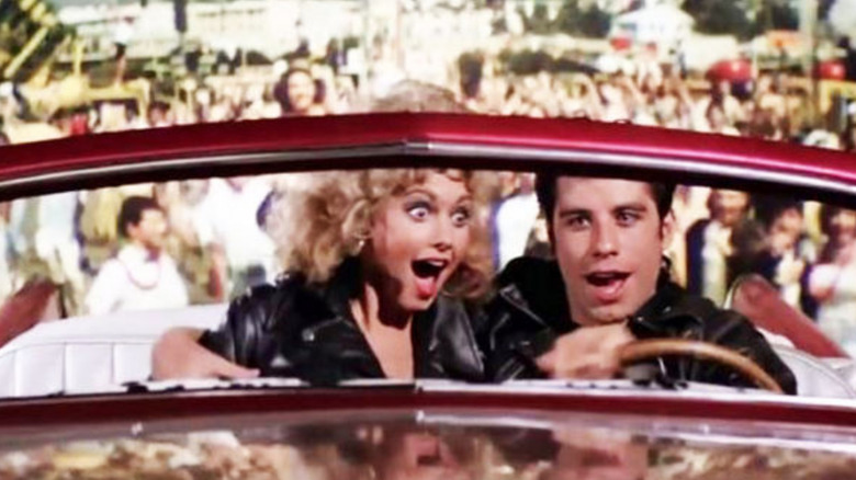 Sandy and Danny in flying car