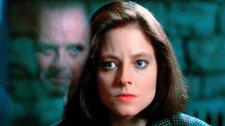 Clarice Starling staring Hannibal Lecter reflection