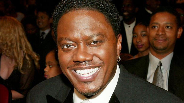 Bernie Mac smiles