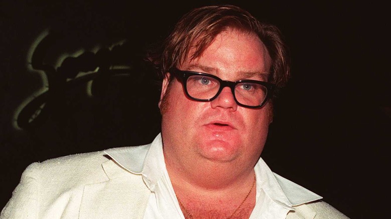 Chris Farley wears glasses