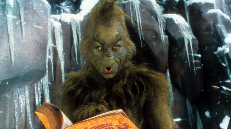 Grinch reading book