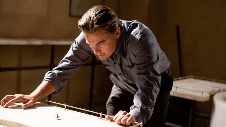 Leonardo DiCaprio determining whether or not he's in a dream