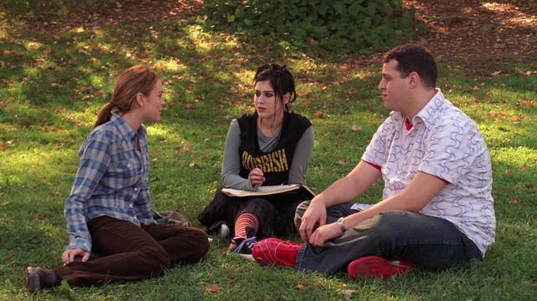 Cady Janis and Damian sitting on lawn