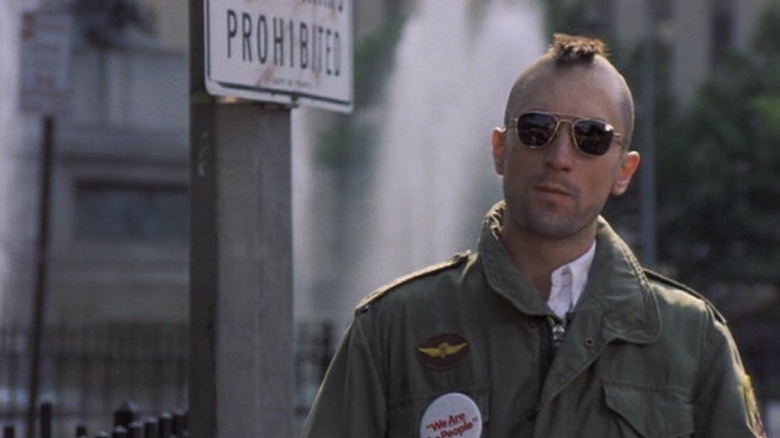 Travis Bickle wearing glasses