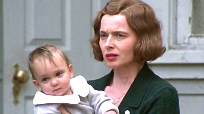 Isabella Rossellini holds a baby