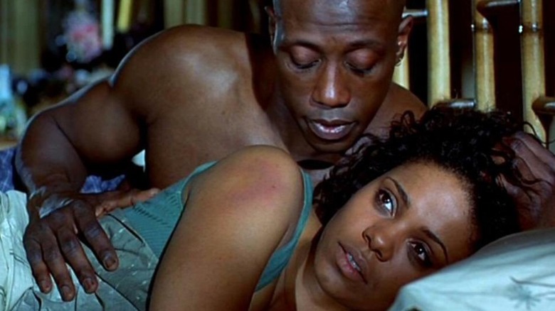 Wesley Snipes and Sanaa Lathan lie together