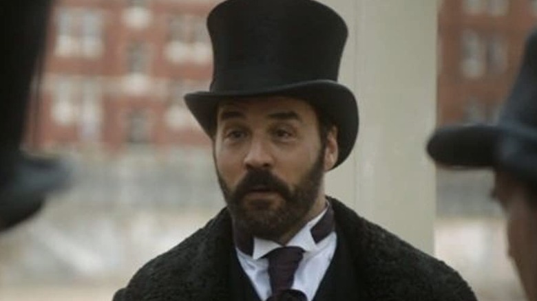 Mr. Selfridge dons a top hat.