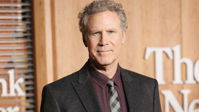 Will Ferrell wears maroon shirt, checkered tie