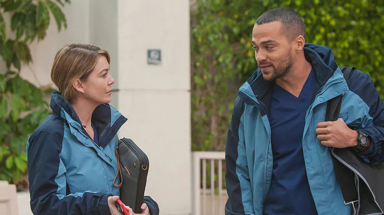 Meredith and Jackson in matching jackets talking