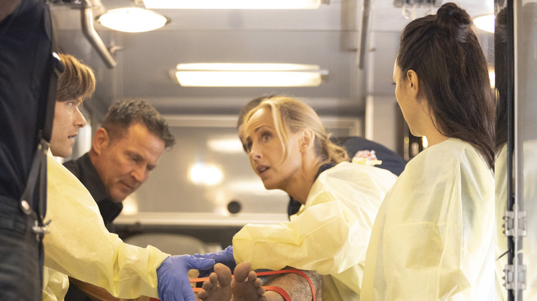 Teddy and her team helping patient