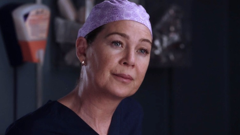 Meredith Grey looking serious in scrubs