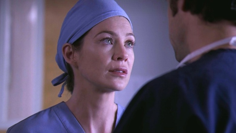 Meredith looking at Derek teary-eyed