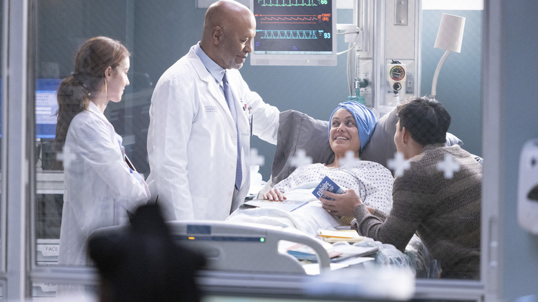 Doctors treating a patient