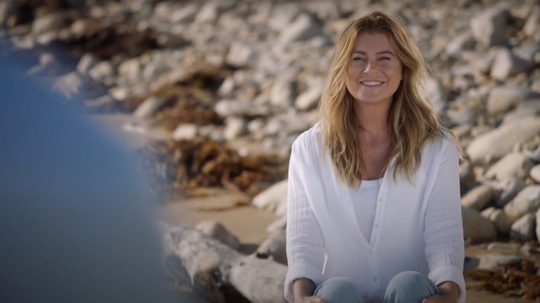 Meredith smiles on the beach