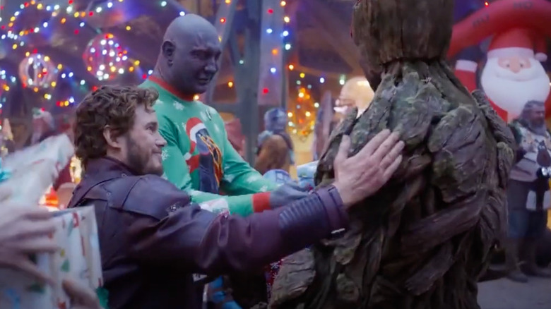 Quill, Drax and Groot with gifts