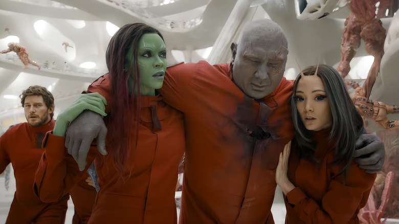 Gamora and Mantis helping wounded Drax