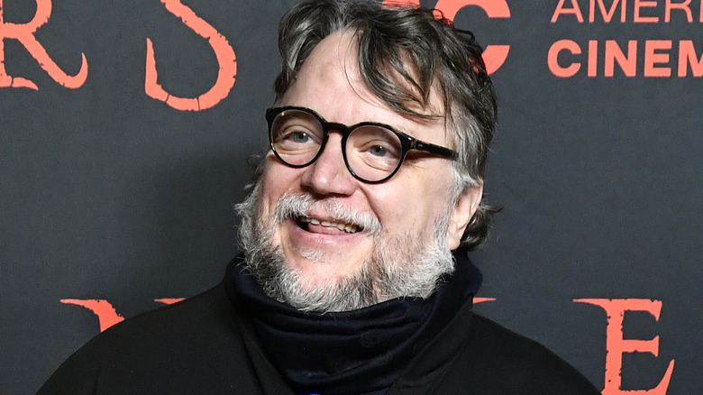 Guillermo del Toro looking to the side