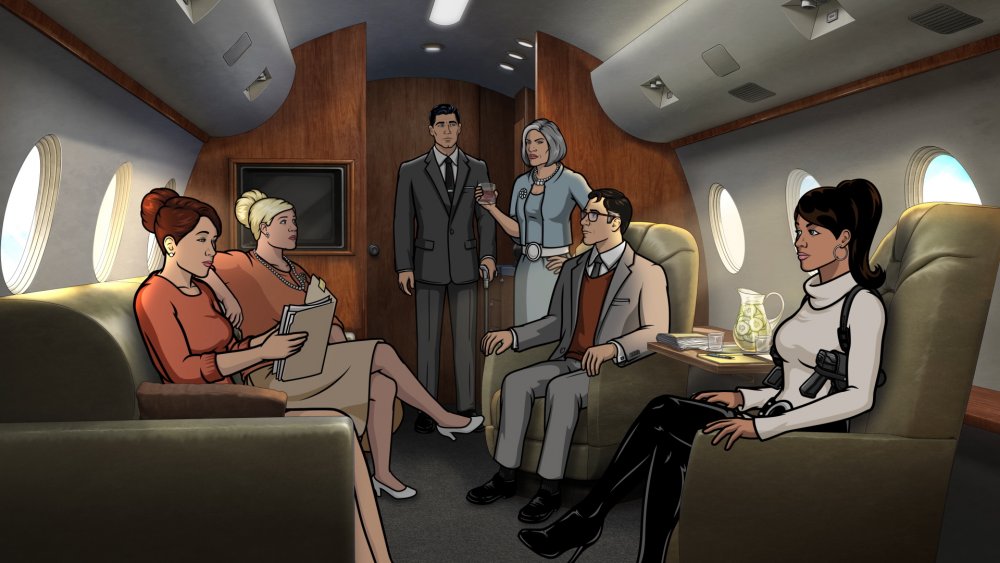 The cast of Archer on a plane