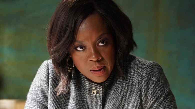 Annalise Keating in front of blackboard