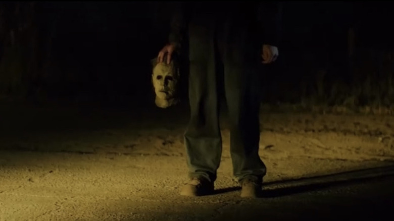 Michael Myers holding mask