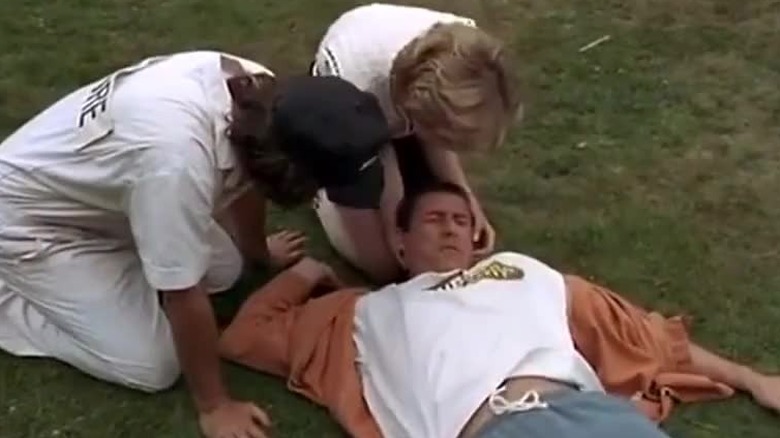 Adam Sandler lying down injured