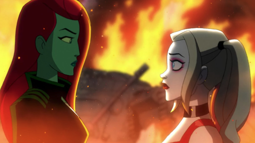 Harley and Ivy stand before flaming Gotham