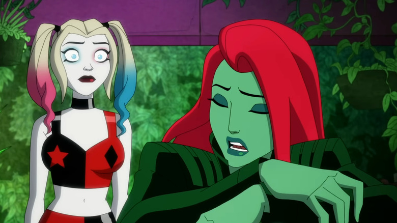 Poison Ivy confessing her problems to Harley Quinn