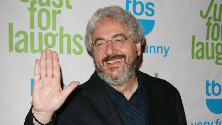 Harold Ramis smiling and waving