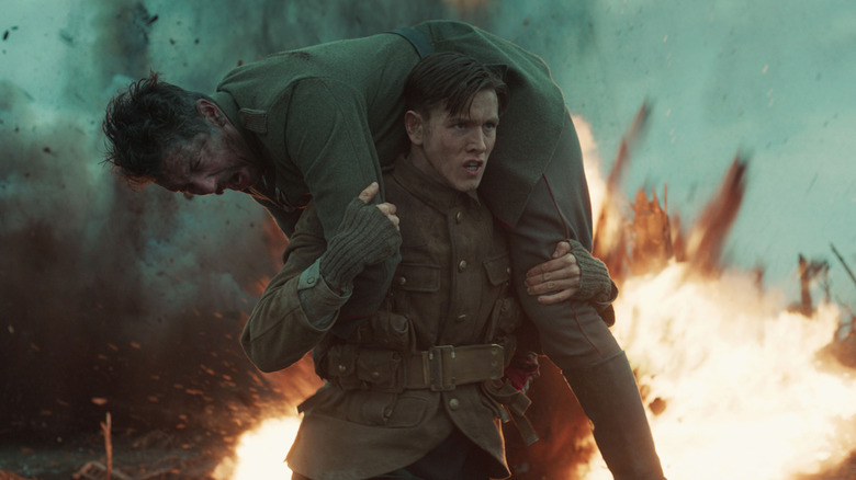 Connor carrying soldier through no man's land