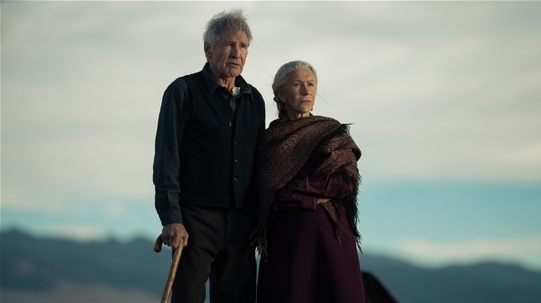 Jacob and Cara in front of a mountainous backdrop