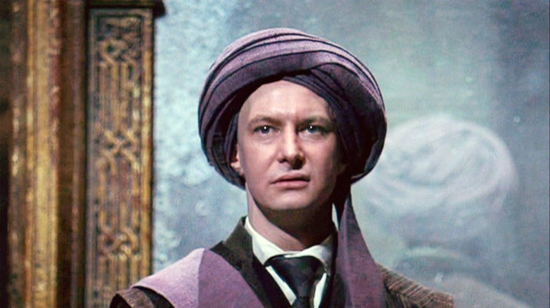 Quirrell stands in front of the mirror