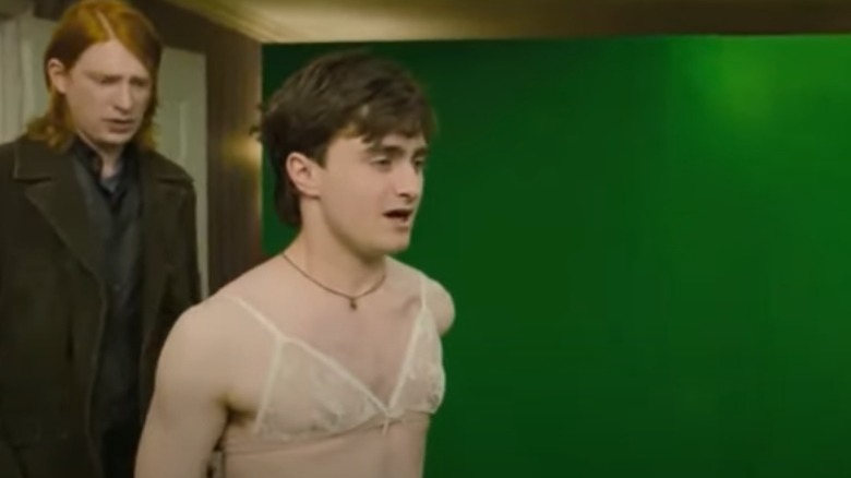 Daniel Radcliffe in a bra in front of green screen