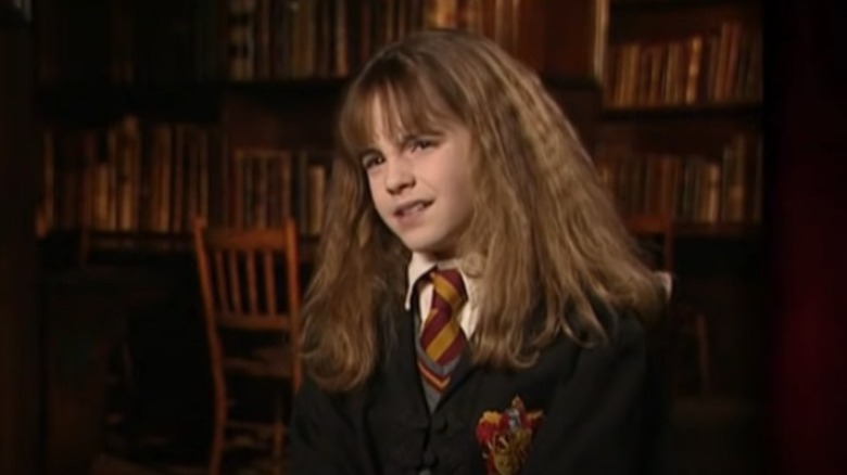 Young Emma Watson wrinkling her nose