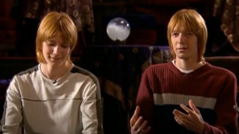 James and Oliver Phelps grinning