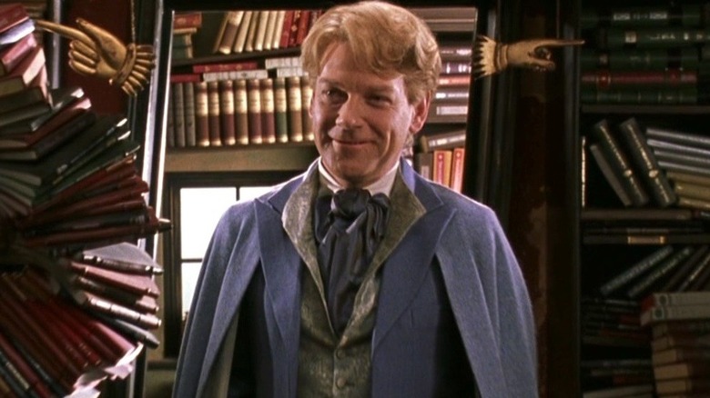 Gilderoy Lockhart smiling purple suit