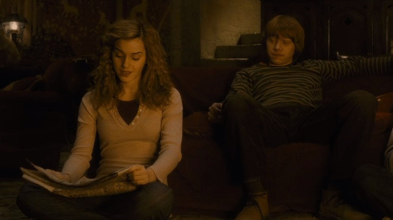 Hermione and Ron sitting