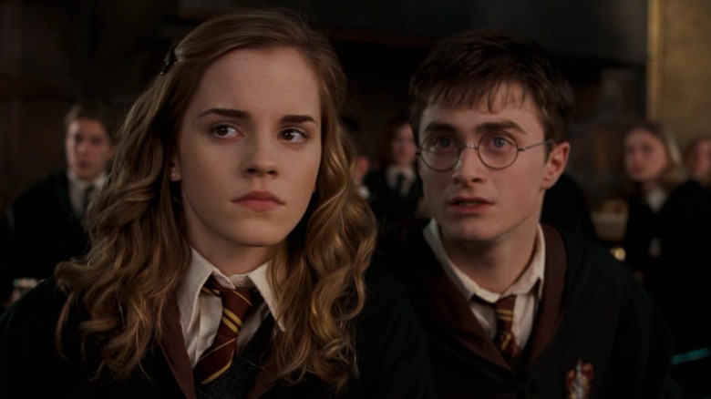 Hermione and Harry looking worried