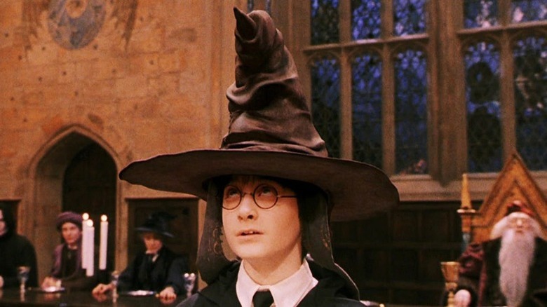 Harry wearing Sorting Hat looking up