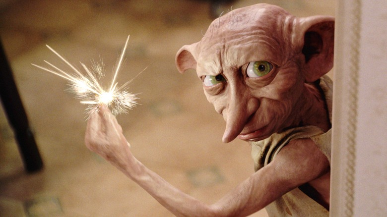 Dobby snapping fingers with magic