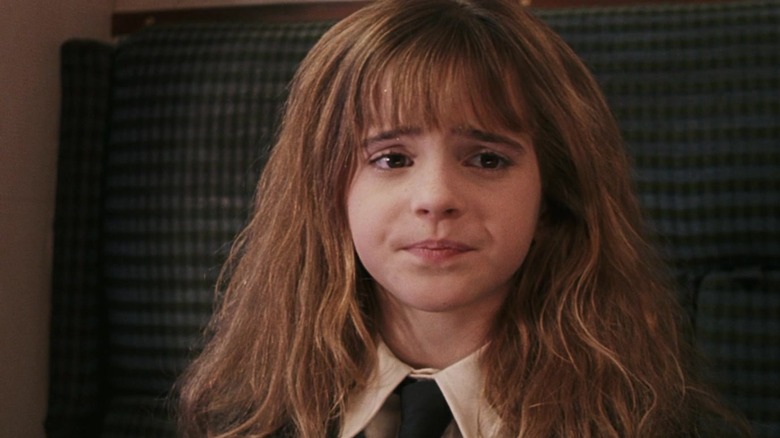 Hermione pursing lips on train