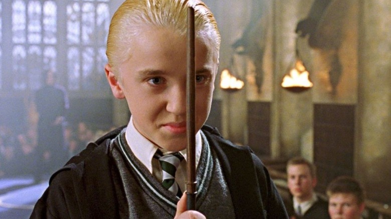 Draco Malfoy duelling Harry Potter