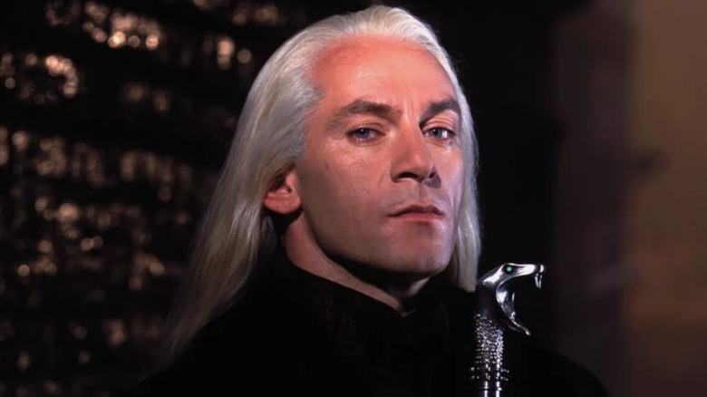 Lucius Malfoy with his signature cane