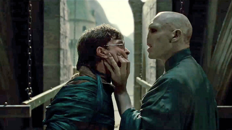 Voldemort grabbing Harry's face