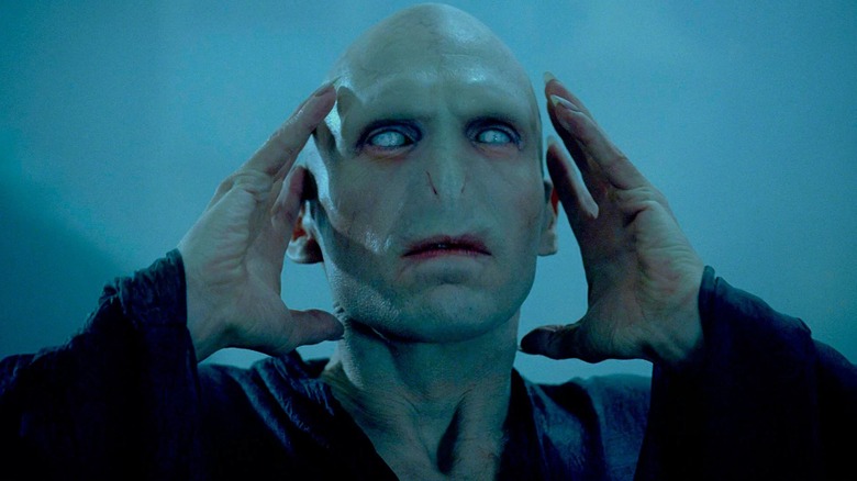 Voldemort raising his hands