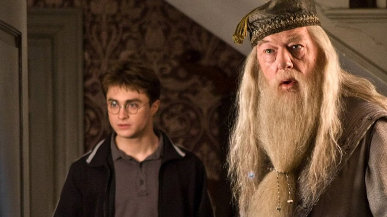 Harry and Dumbledore staring confused